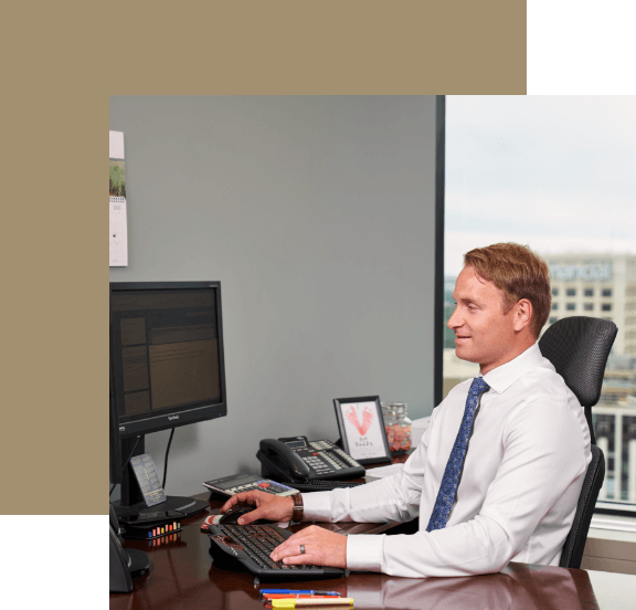 A member of our team working at his computer.